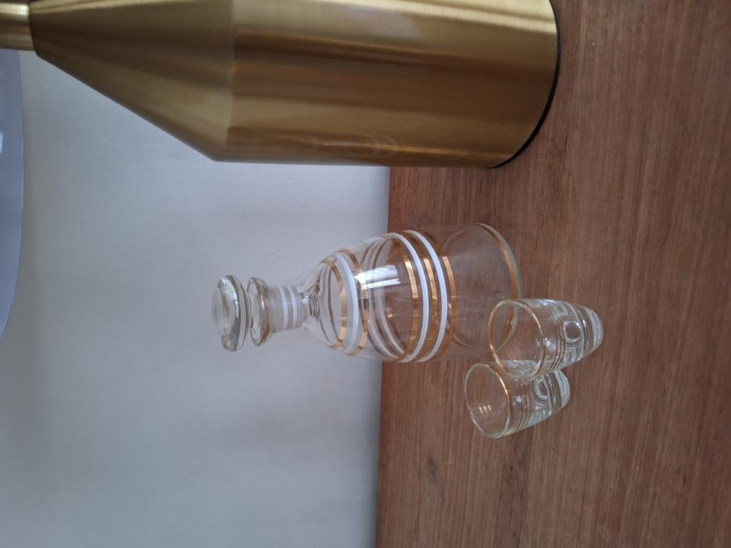 mini karaf met gouden randen, Ophalen