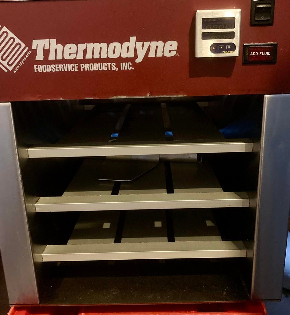 Warmhoudkast voor gastrobakken, Ophalen