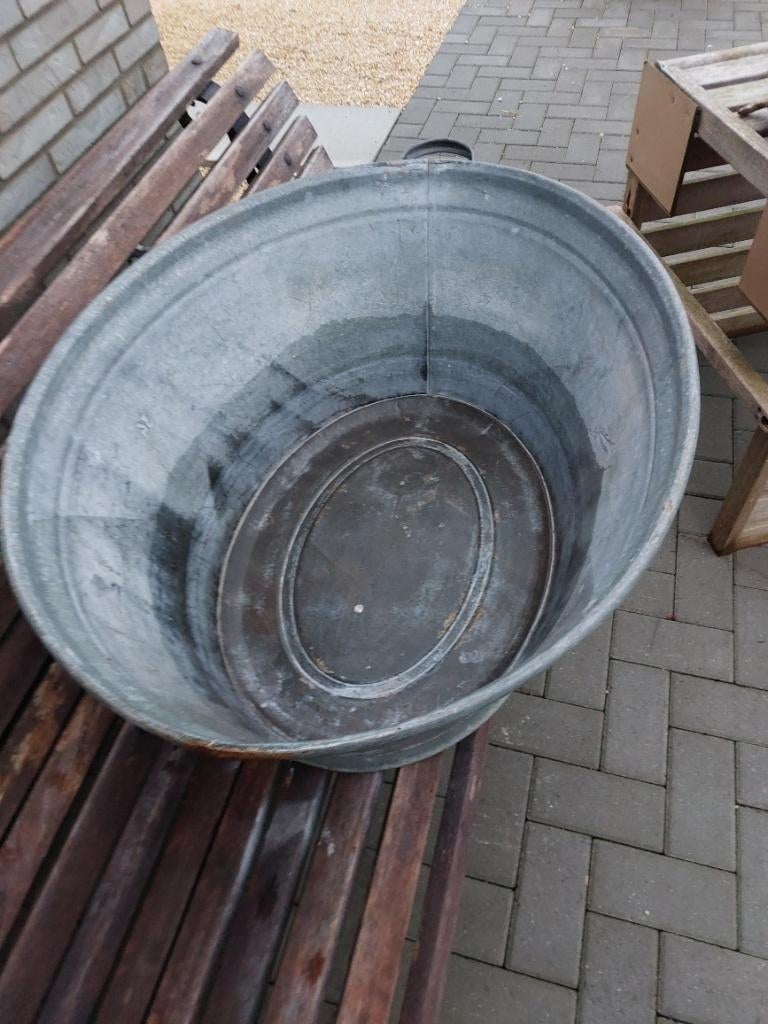 zinken tijl badkuip, Ophalen