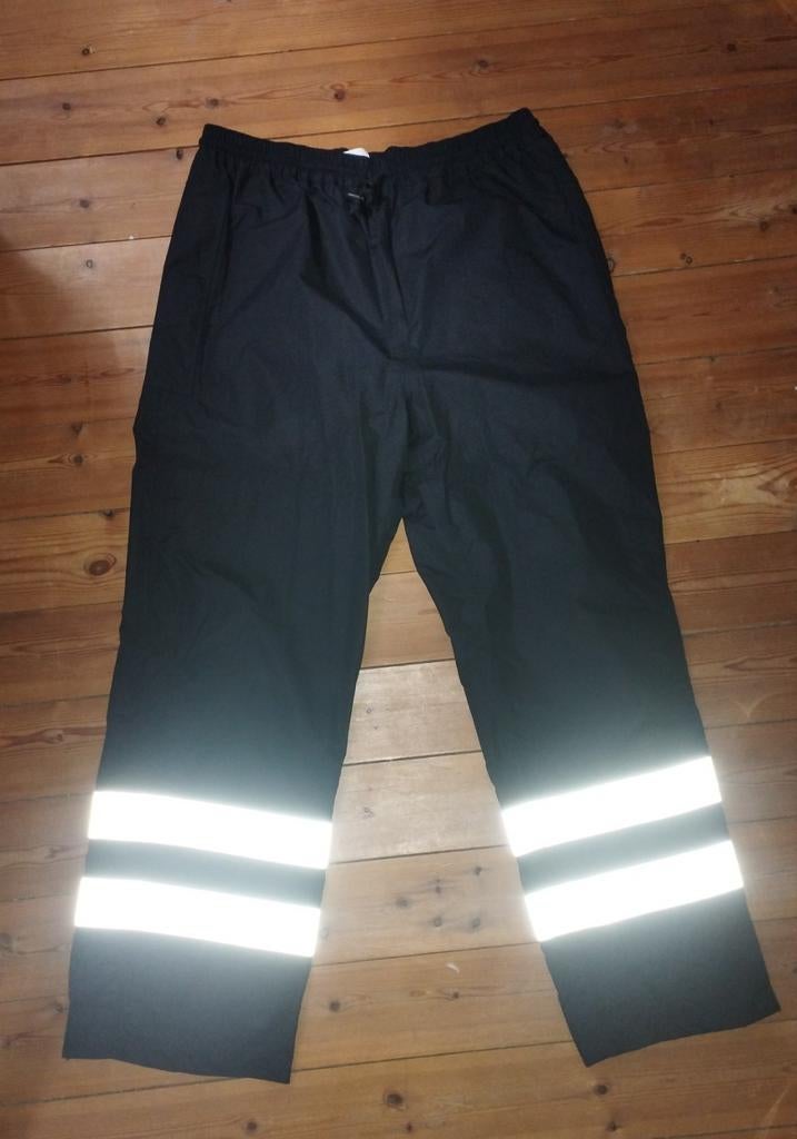 Pantalon de pluie hyper imperméable, Enlèvement