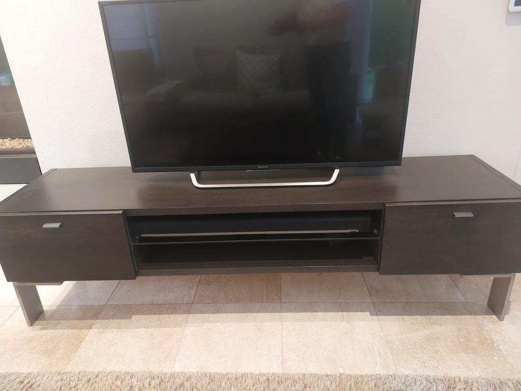 TV meubel Zymbioz, Ophalen