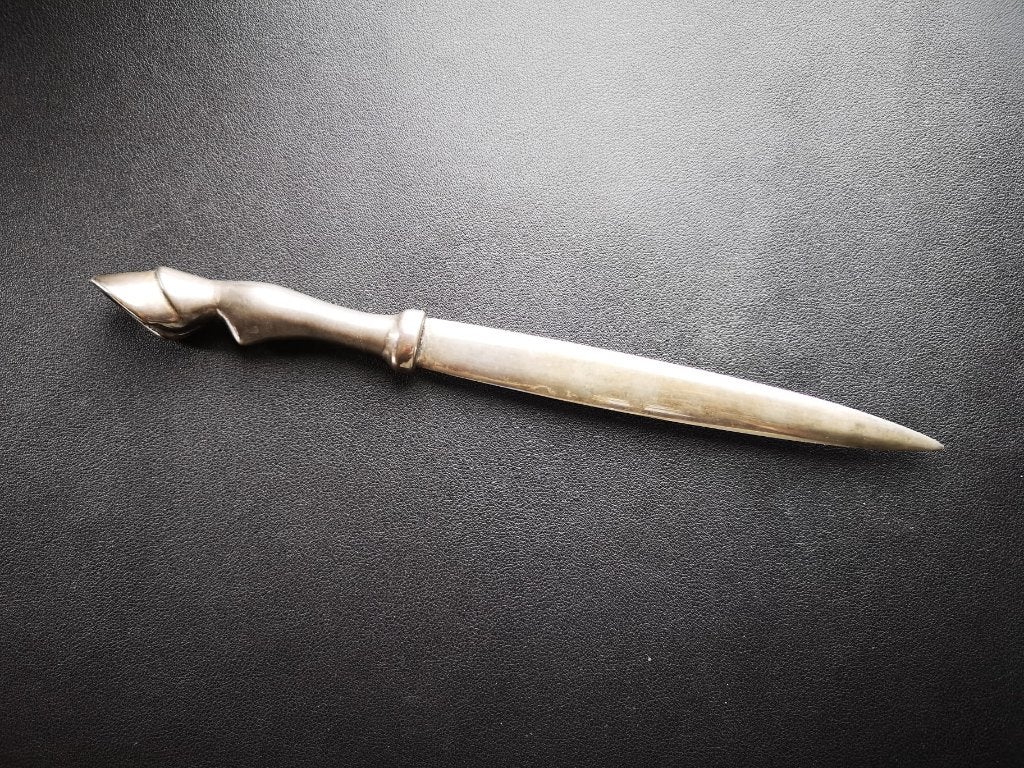 antieke brief opener, Ophalen