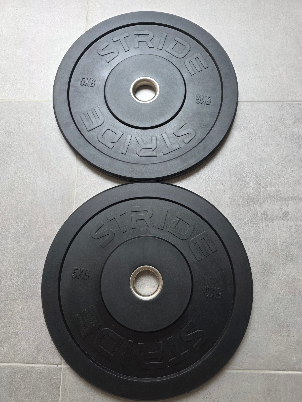 NIEUW — Stride bumperschijven van 2x5 kg — Zwart rubber — Ø5, Sport en Fitness, Fitnessmaterialen, Ophalen of Verzenden, Nieuw