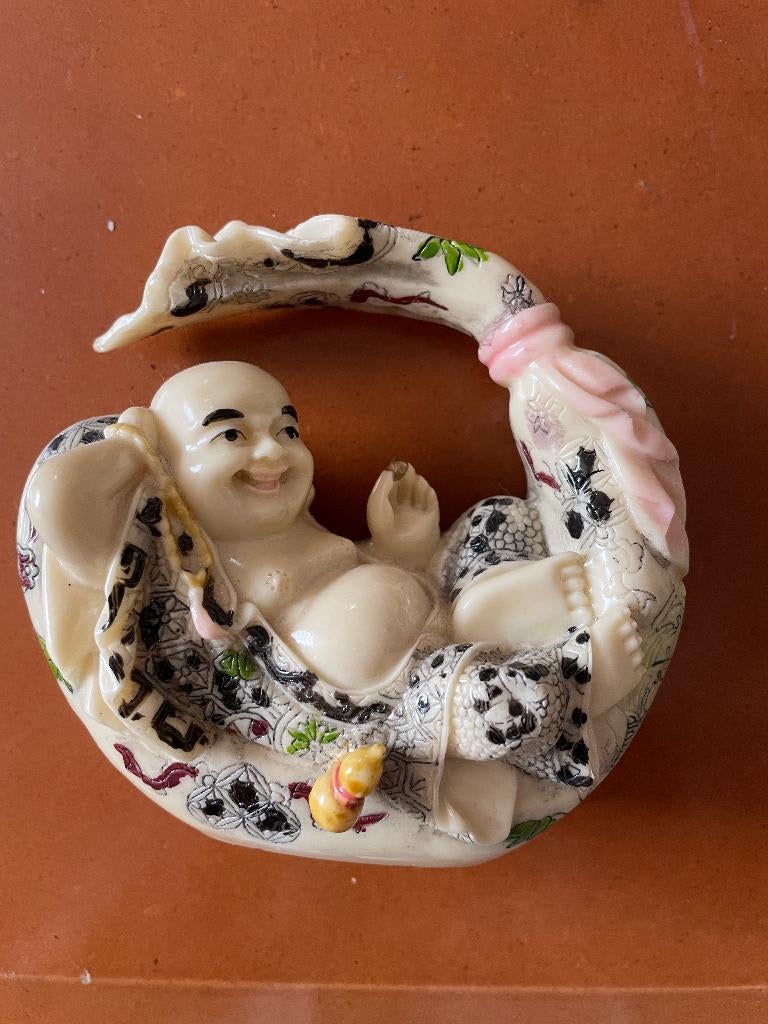 statuette chinoise en résine, Enlèvement