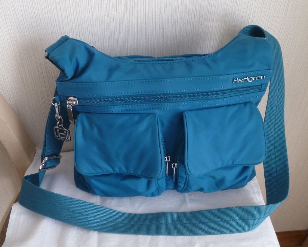 Hedgren sac bandoulière nombreuses poches+ "H"en métal, Enlèvement ou Envoi, Utilisé, Bleu, Autres marques