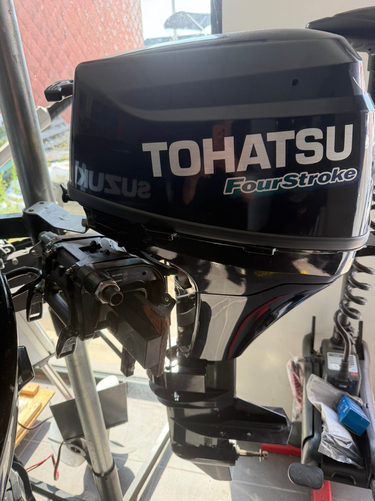 Tohatsu buiten boord moter 9.8 pk, Ophalen of Verzenden, Zo goed als nieuw, Buitenboordmotor