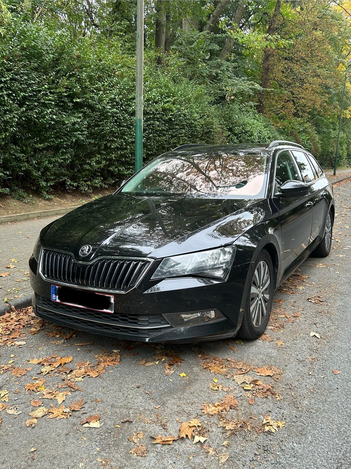 Skoda Superb stationwagen 1.6 TDI, Auto's, Adaptive Cruise Control, Euro 6, Zwart, Leder