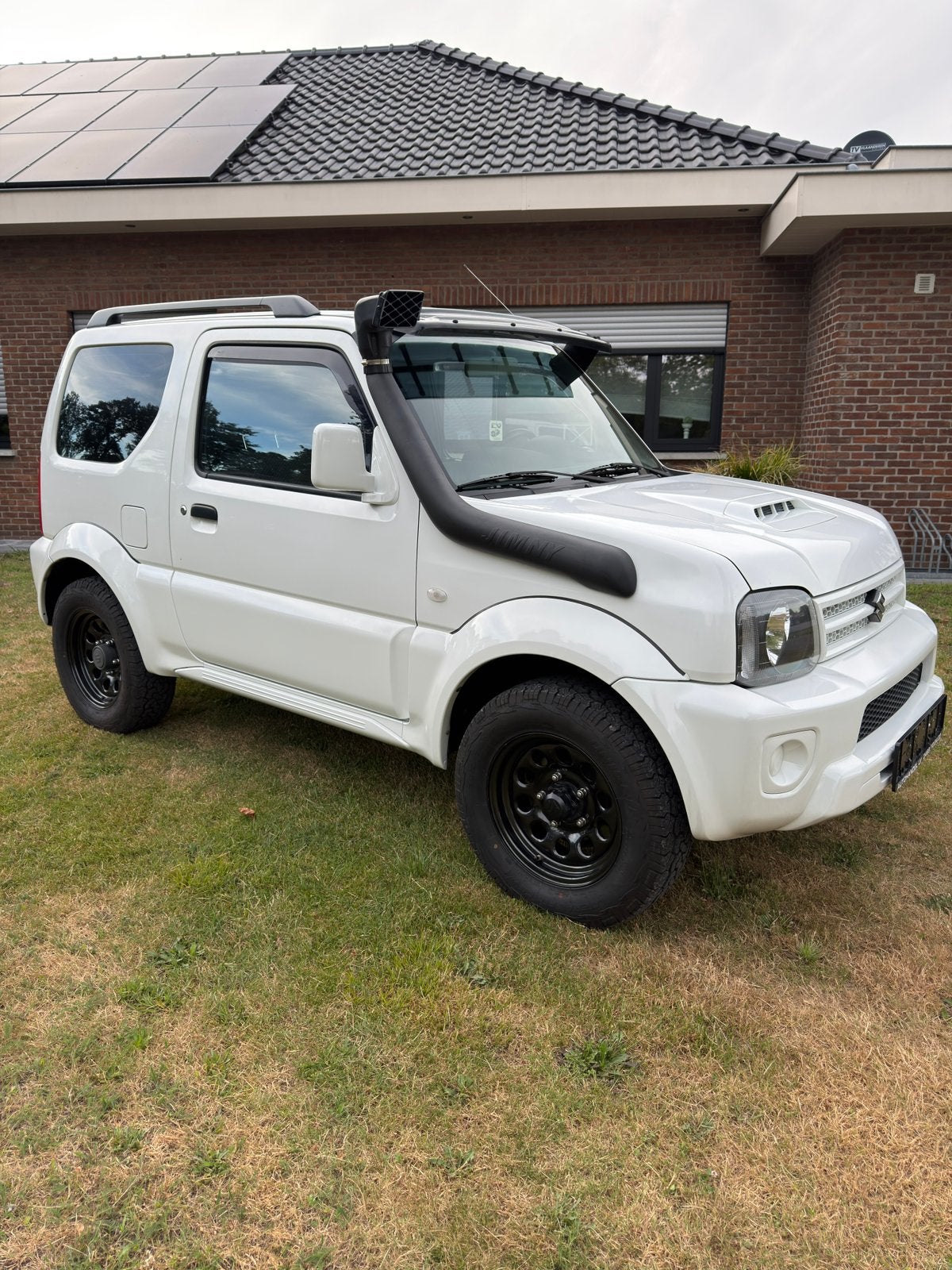 Suzuki Jimny 4x4 *1.3Benzine*Snorkel*Gekeurd*, Auto's, 4 zetels, Wit, https://public.car-pass.be/verify/7587-4210-2567, Bedrijf
