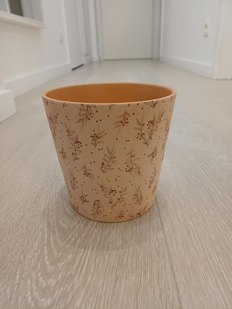 Oranje bloempot, Ophalen