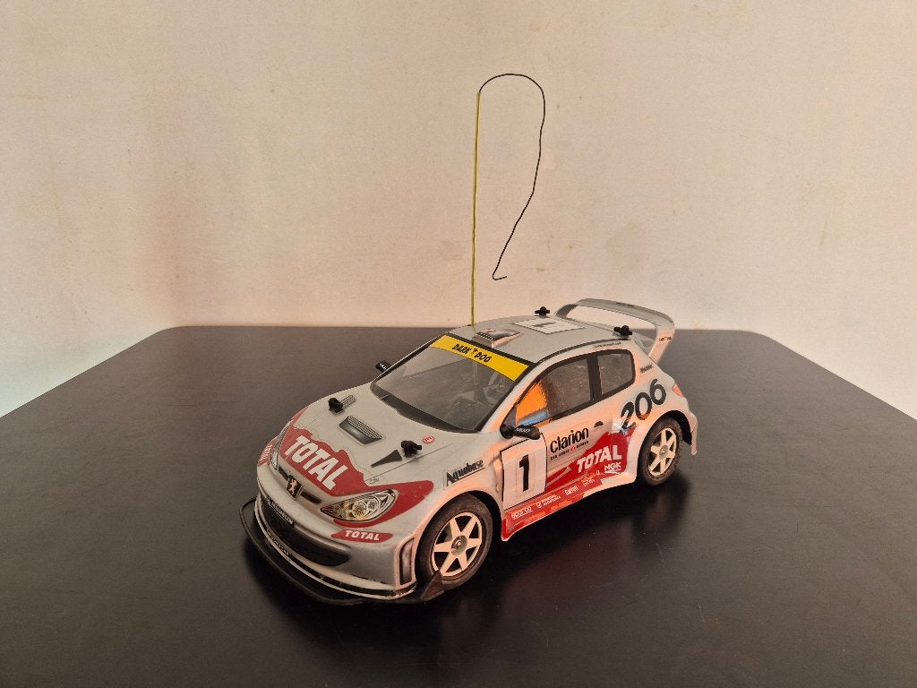 R/C Nikko Peugeot 206 WRC-auto, Hobby en Vrije tijd, Gebruikt, Schaal 1:14, Auto onroad, RTR (Ready to Run)