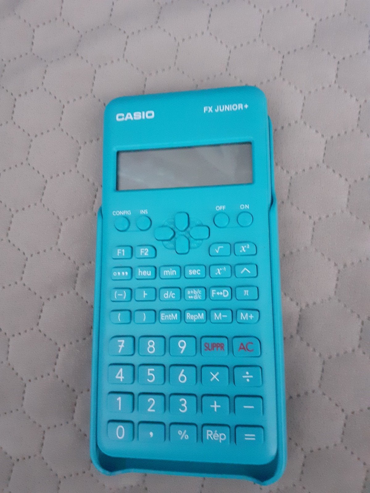 een rekenmachine casio fx junior+, Enlèvement