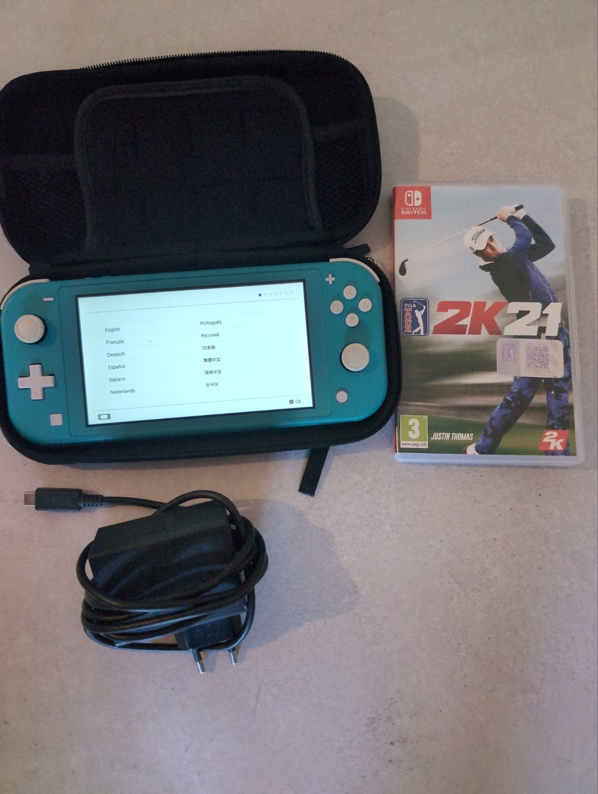 Switch lite turquoise + 1 jeu + housse., Games en Spelcomputers, Ophalen, Turquoise, Gebruikt, Met beschermhoes of tas