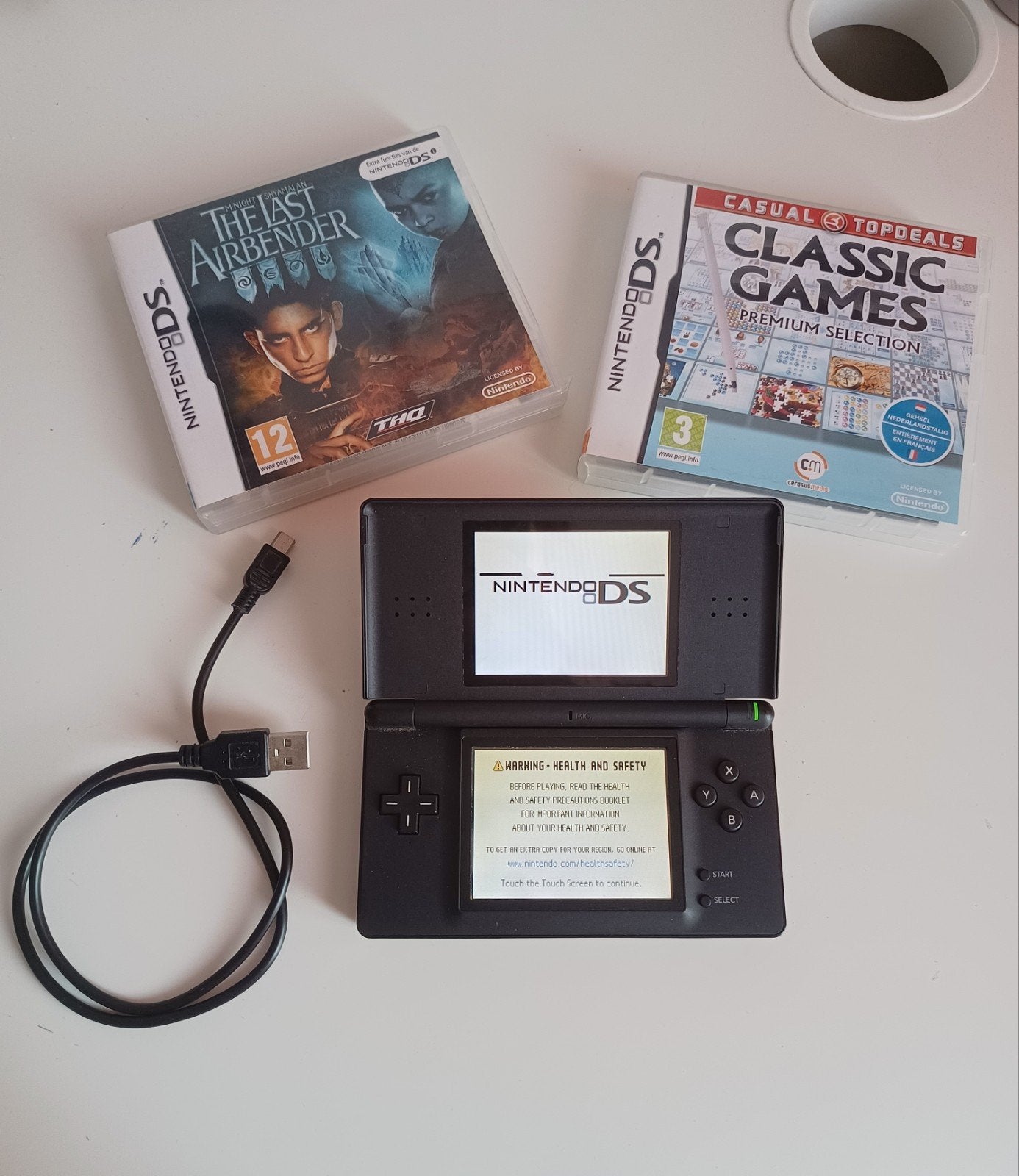 Nintendo DS Lite 2006 zwart+kabel+ 2 Avatar&Classic-spelspel, Zwart, Ophalen of Verzenden, DS Lite, Gebruikt