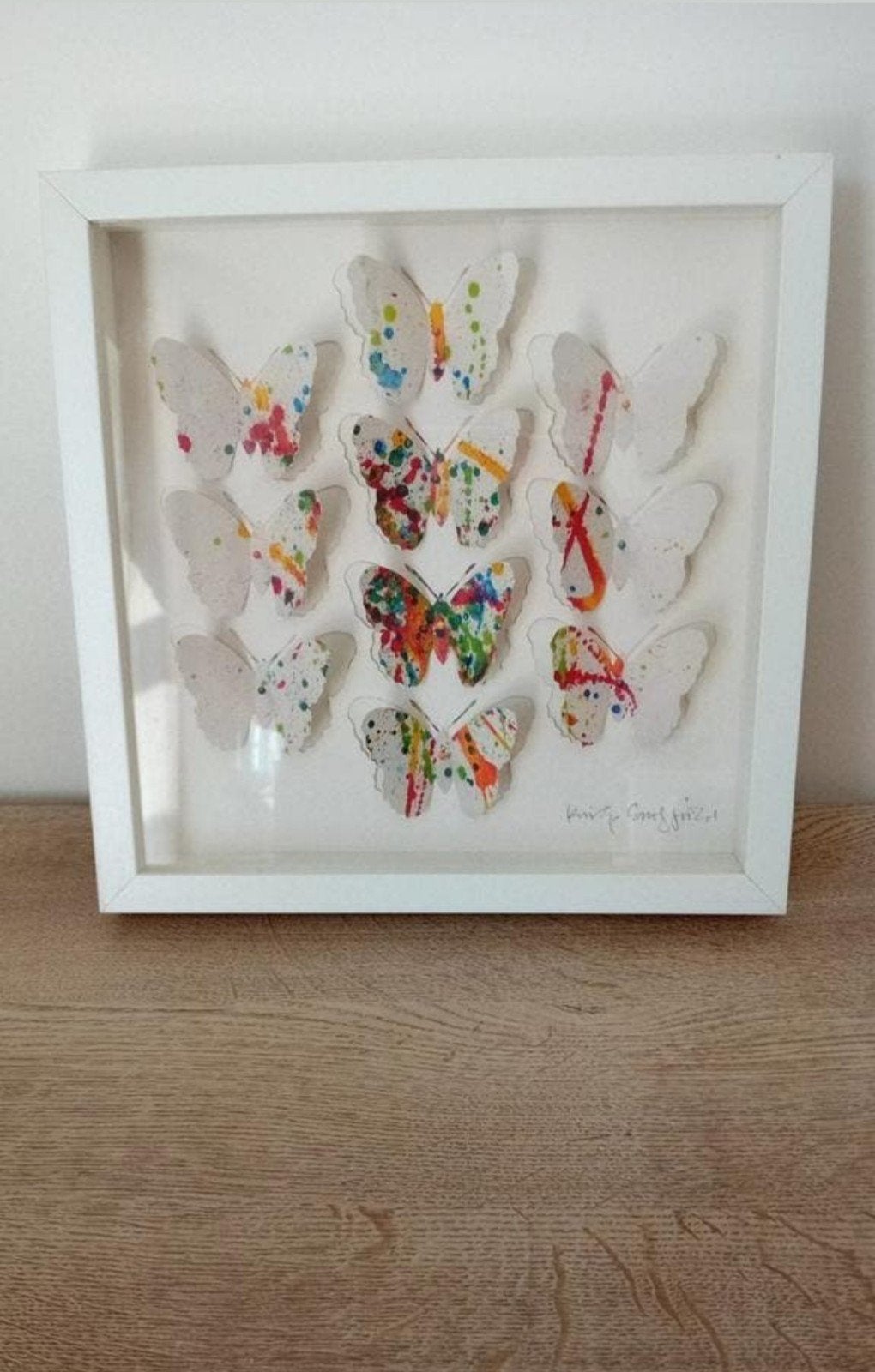 Wit frame met kleurrijke vlinders in reliëf, Ophalen of Verzenden, Zo goed als nieuw, Overige materialen