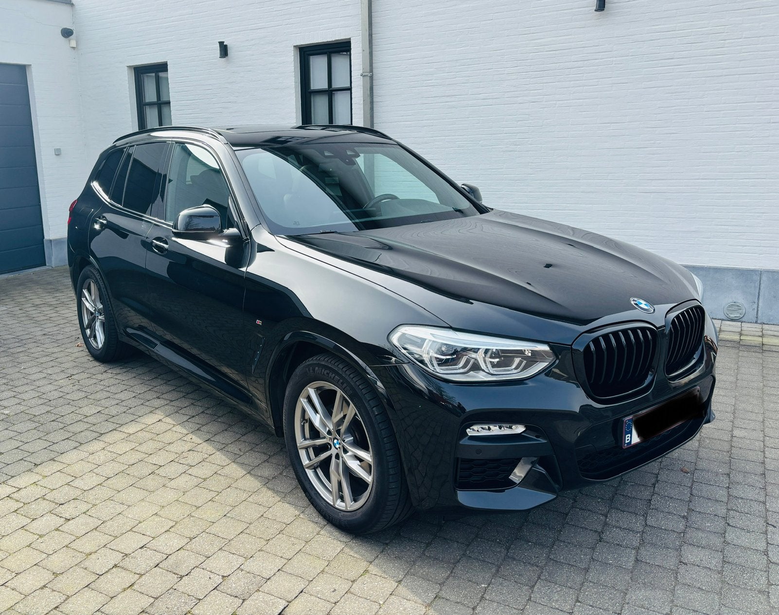 BMW X3 xDrive20i Model M Sport, Auto's, BMW, Automaat, 1998 cc, 4 cilinders, Zwart