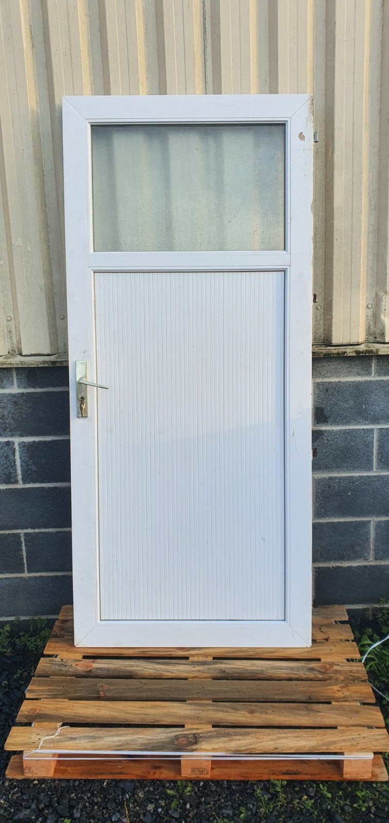 Porte de service pvc 1/4 vitrée Servicio 97 x h.208 poussant