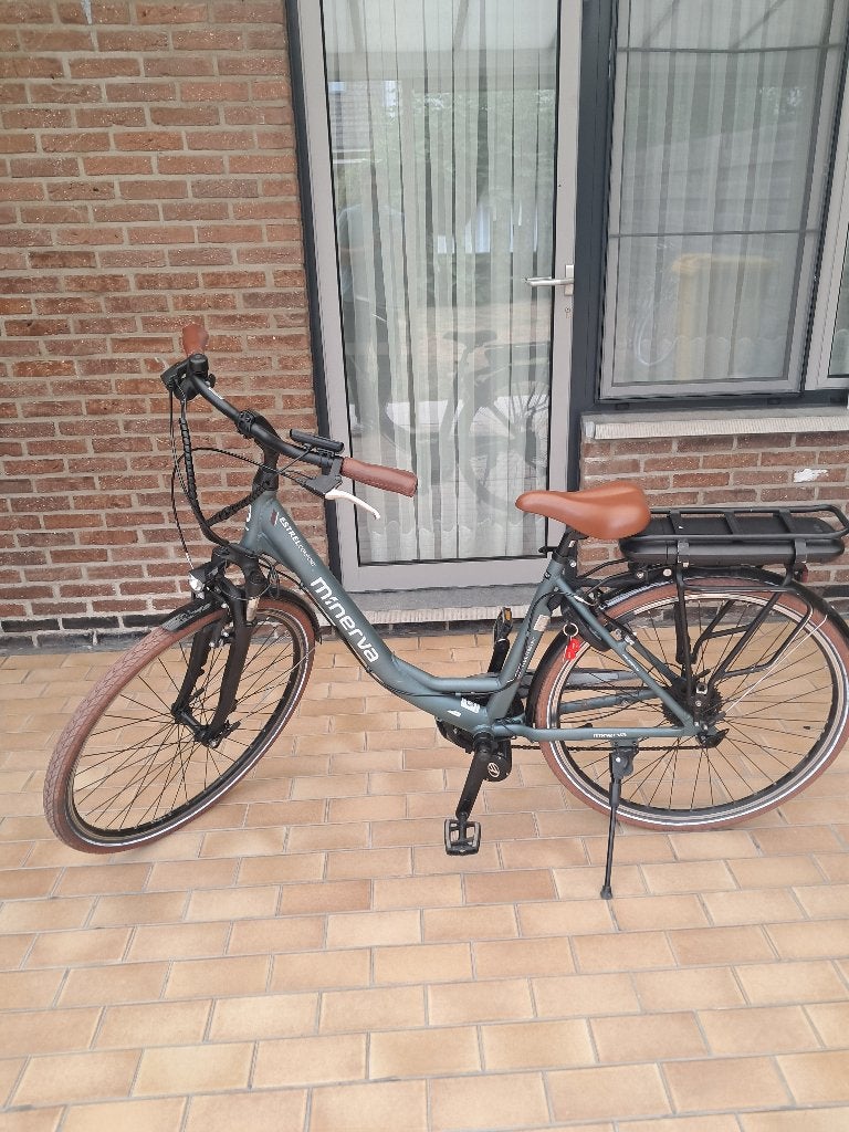 E-bike Minerva, Ophalen, Zo goed als nieuw, 50 km per accu of meer