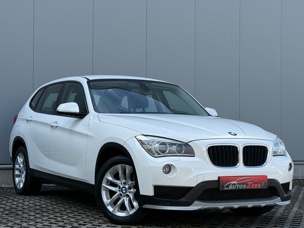 BMW X1 2.0 dA sDrive18 Xenon Camera Cruise Navi DigAirco, Auto's, Euro 5, 1995 cc, Zwart, Wit