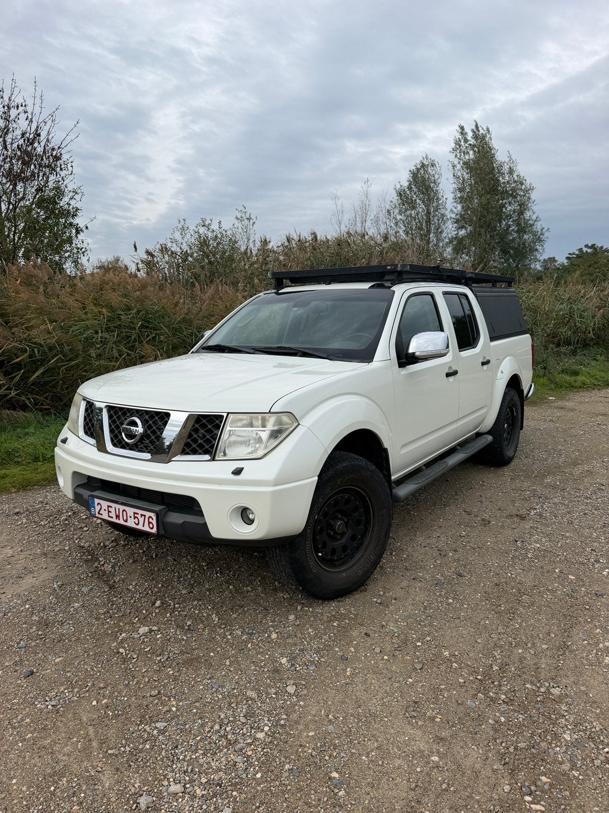 Nissan Navara D40 2.5 dCi 4x4 –171 pk–Full option–Alu-Cab, Zwart, Wit, Leder, Bedrijf
