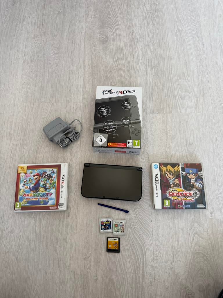 Nieuwe Nintendo 3ds XL in doos met 7 games, Ophalen, Zwart, 3DS XL, Gebruikt