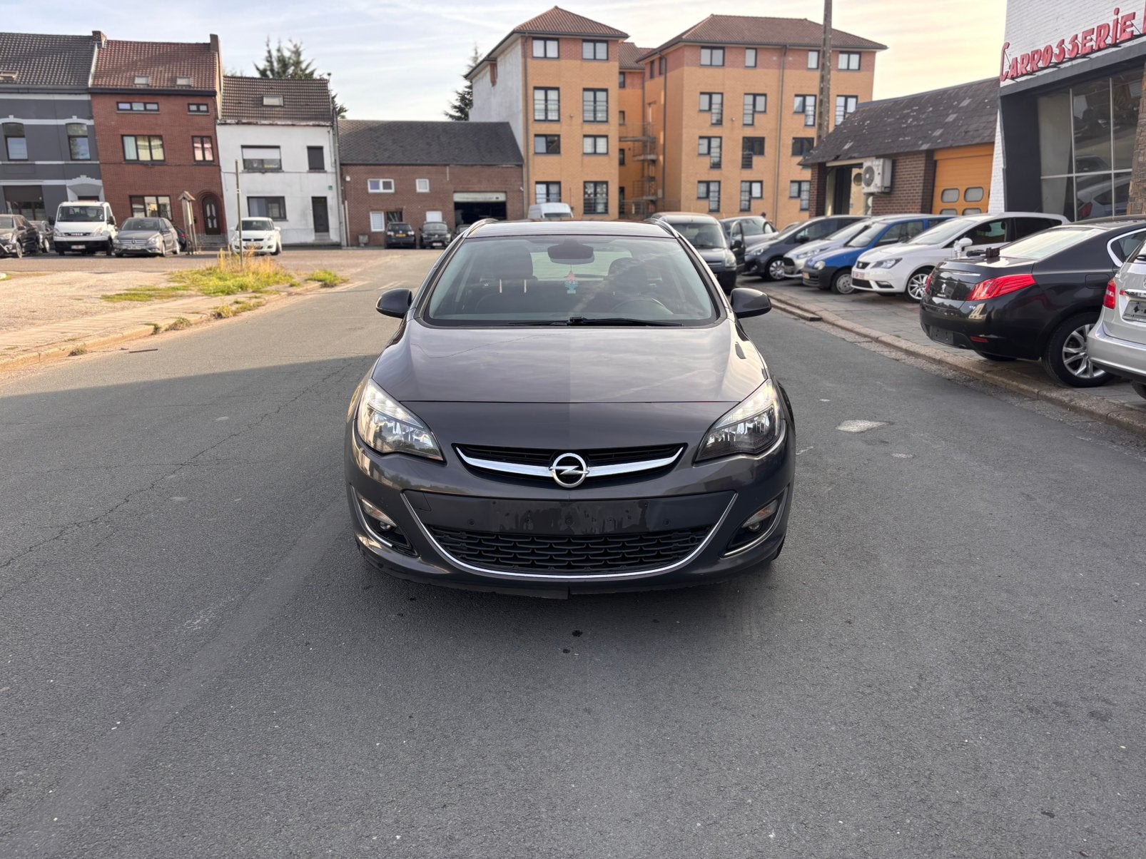 Opel astra 2014 euro 5b, Auto's, Voorwielaandrijving, Euro 5, Stof, Zwart