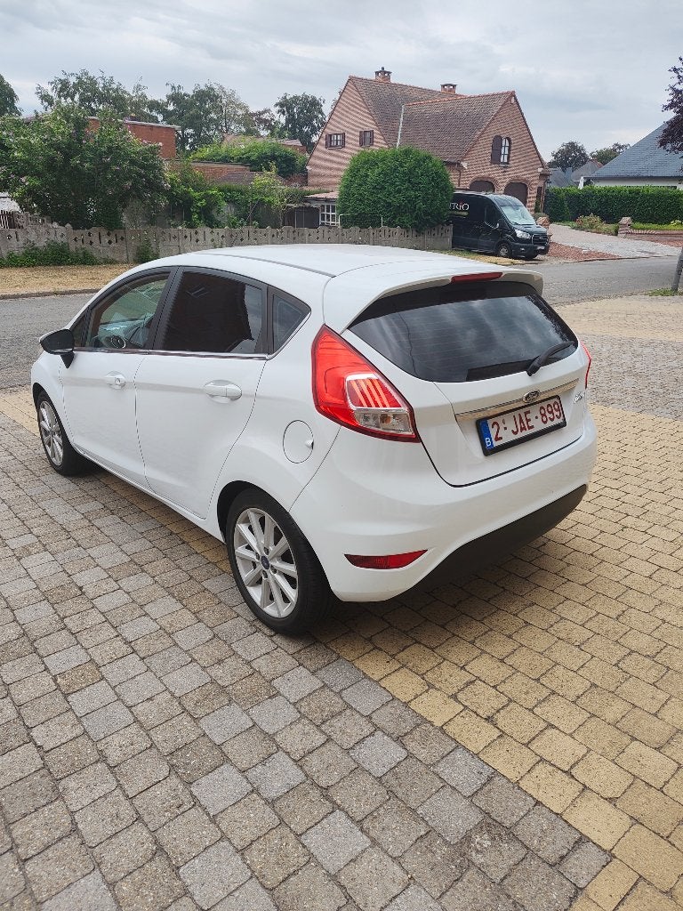 1.25 Ford fiesta heel goede staat. Airco, zetelverwarming, Autos, Ford, Achat, 50 kW, Euro 6, Noir