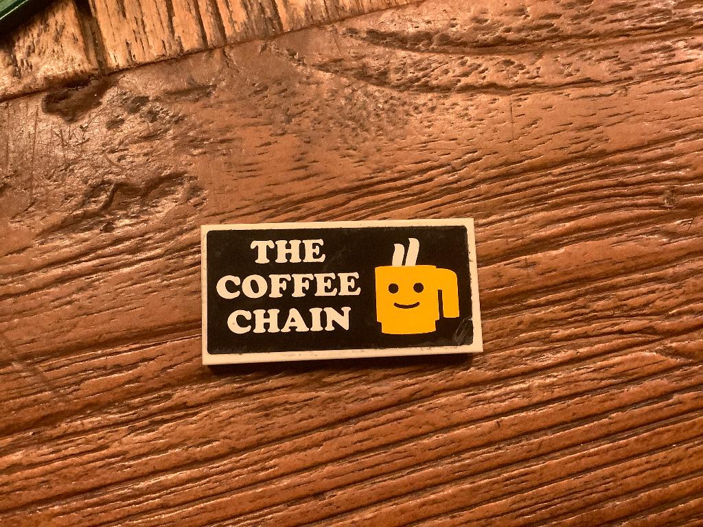 Lego tegel ‘THE COFFEE CHAIN' / 424-T1, Ophalen of Verzenden, Gebruikt, Losse stenen, Lego