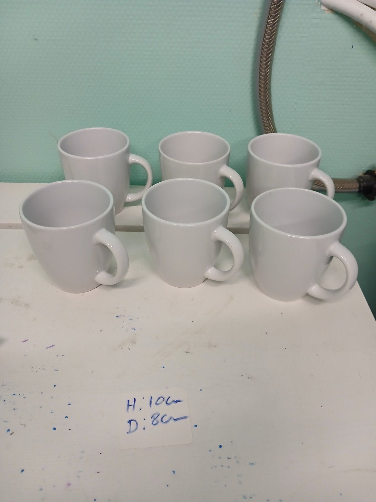 6 tasses blanche, Enlèvement
