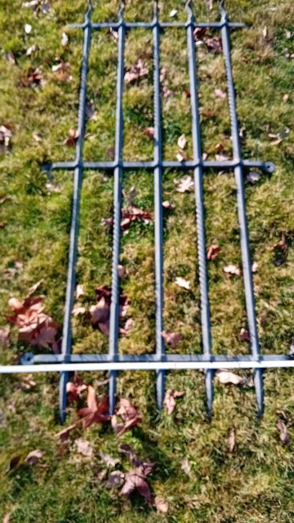antieke smeedijzeren raamroosters, Ophalen