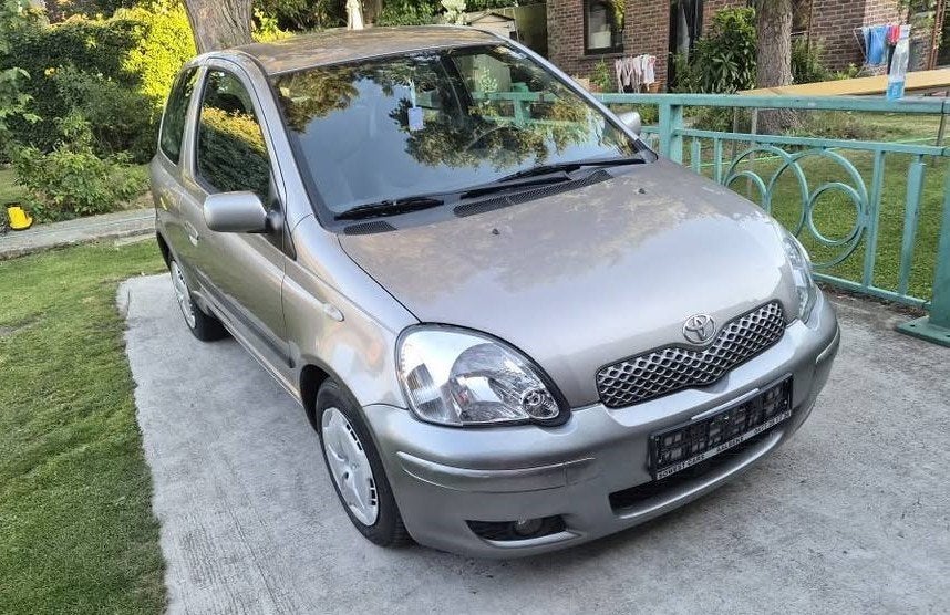 Toyota yaris 1300 vvt-i Boîte automatique Climatisation, Stof, 4 cilinders, Bruin, Berline