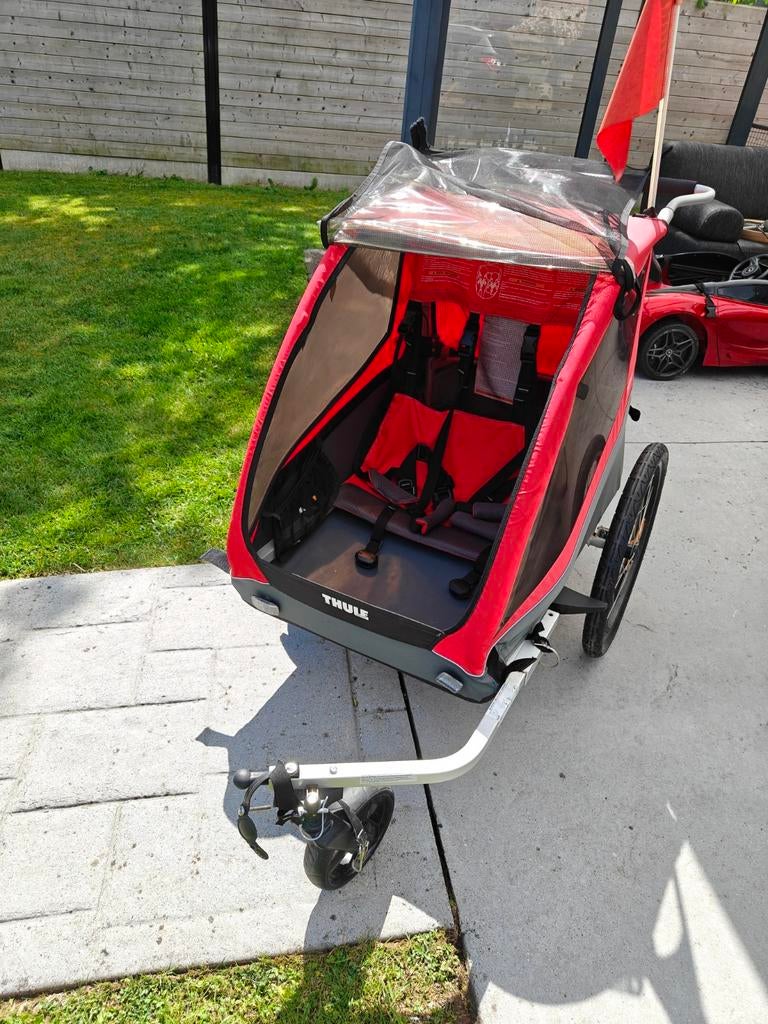 Unique Thule Coaster XT (rouge limité) — Excellent état !, Vélos & Vélomoteurs, Enlèvement, Comme neuf, Remorque pour enfant, THULE