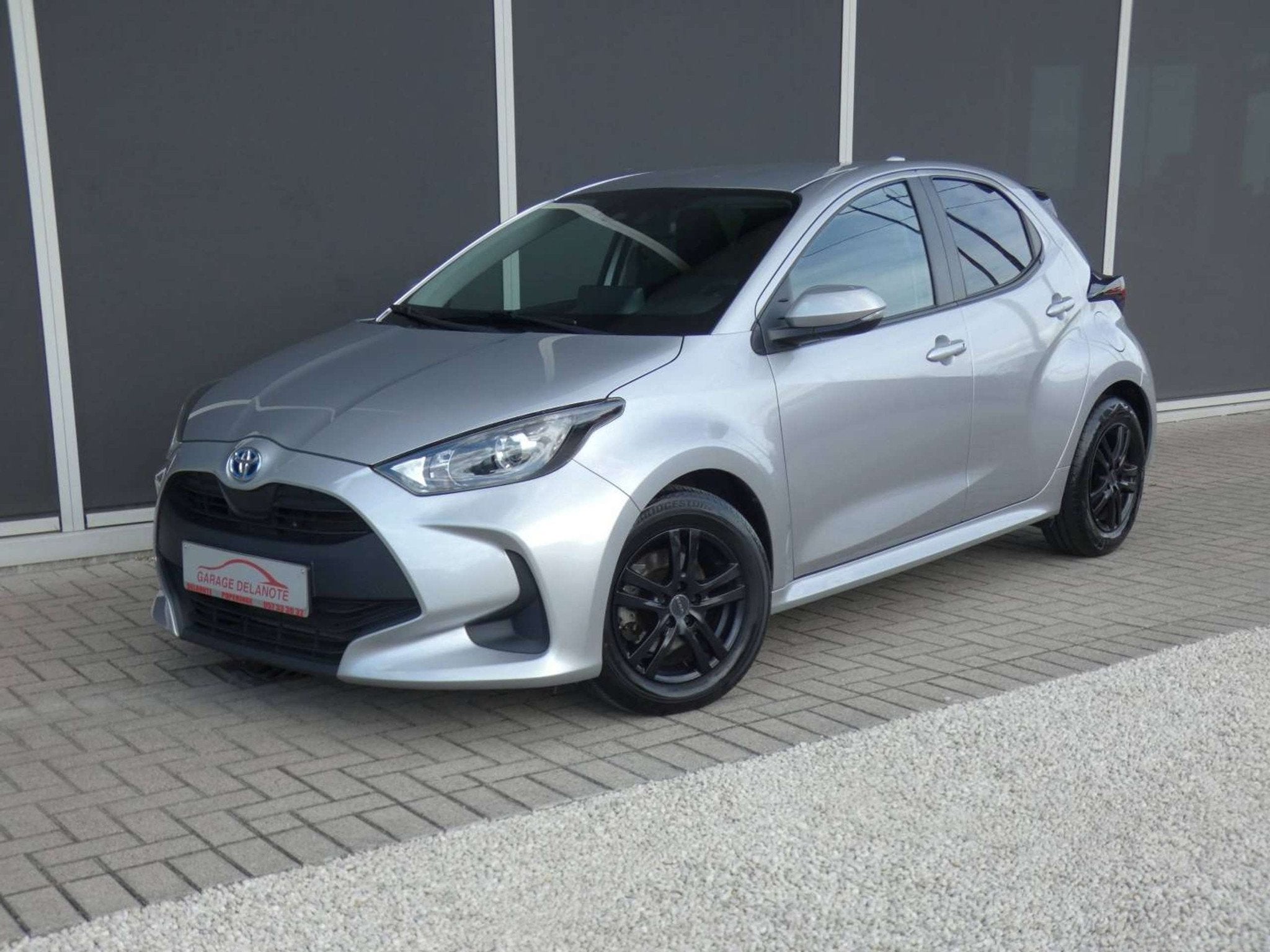 Toyota Yaris HYBRID Dynamic +GPS +Parkeercamera +Getinte ram, Auto's, Stof, Gebruikt, 116 pk, Bedrijf