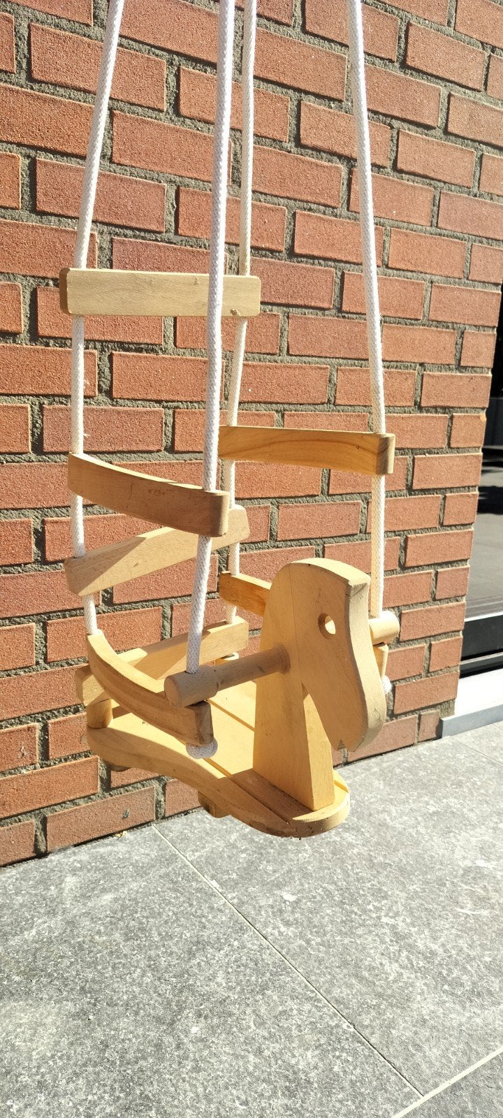 Houten schommel paard, Ophalen, Schommel