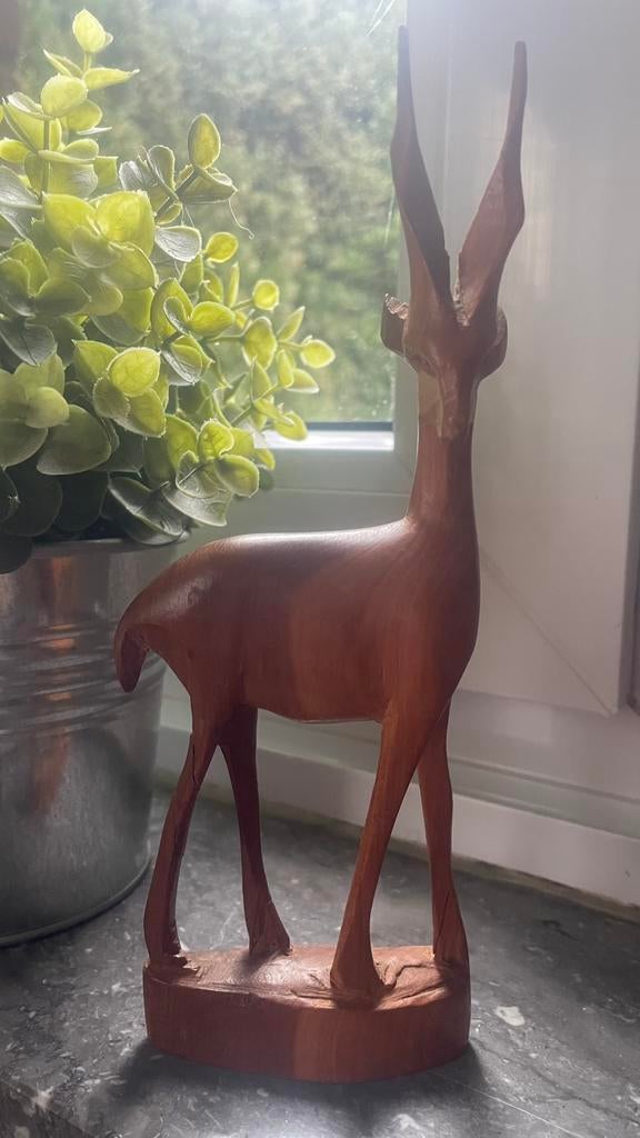 Houten antilope gazelle beeldje, Enlèvement