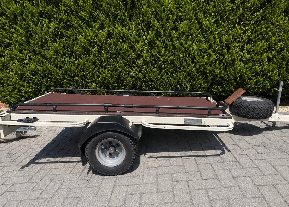 Motor trailer, Ophalen, Zo goed als nieuw