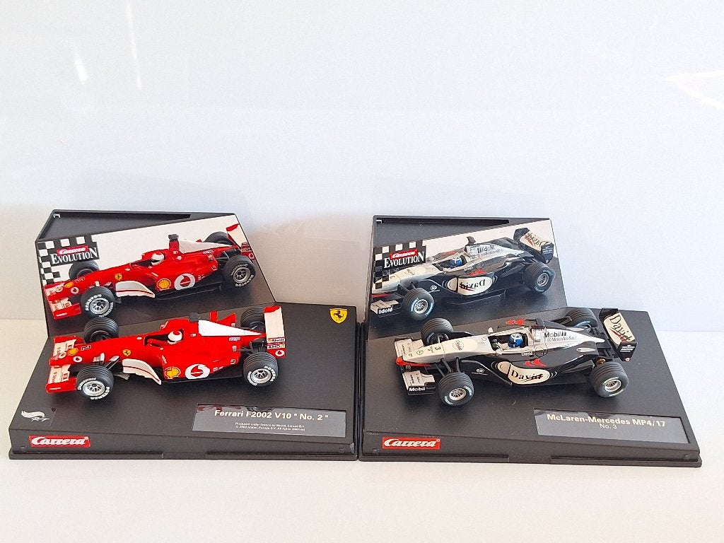 Carrera Evolution 1 x F1 Ferrari 1 x F1 Mc-Laren, Neuf, Électrique, Enlèvement ou Envoi, Carrera
