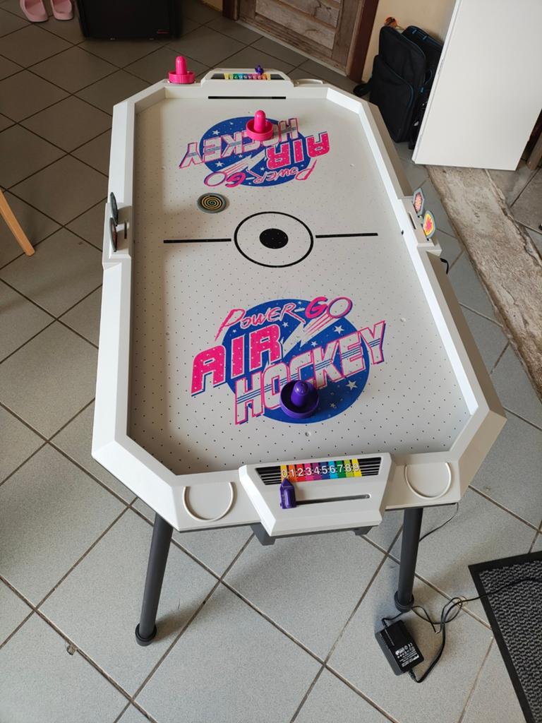 Air hockey spel, Ophalen