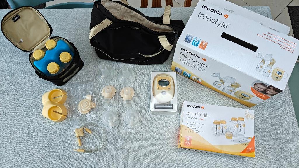 Medela Freestyle Borstkolf met accessoires en Calma flesjes, Kinderen en Baby's, Babyvoeding en Toebehoren, Ophalen, Gebruikt