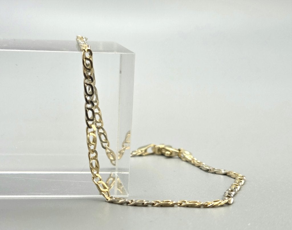 Vintage gouden valkenoog schakel armband. 2026/618, Ophalen of Verzenden, Zo goed als nieuw, Geel, Goud