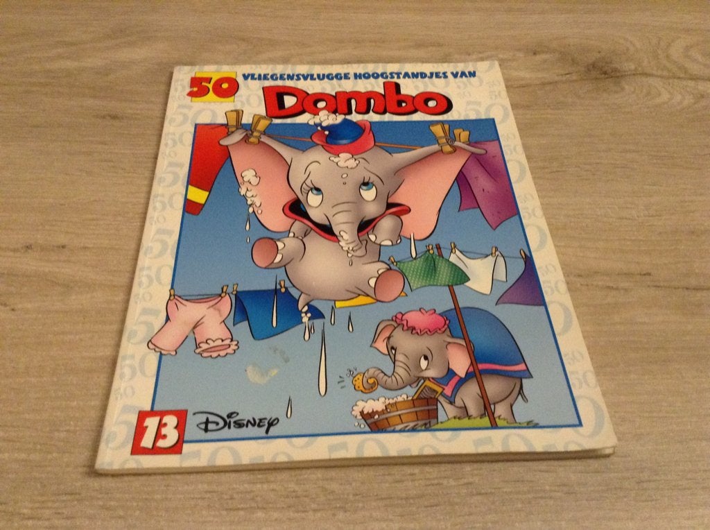 Disney 50 vliegensvlugge hoogstandjes van Dumbo strip (2009), Boeken, Ophalen of Verzenden, Zo goed als nieuw, Walt Disney, Eén stripboek
