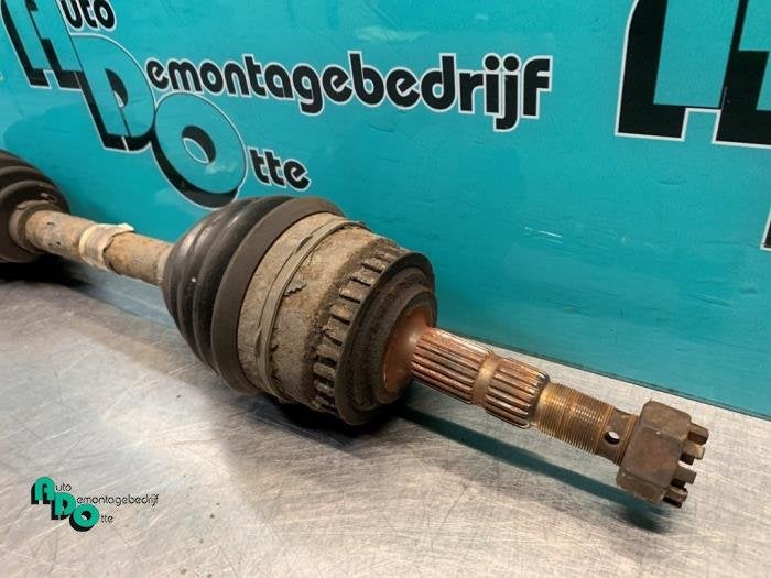 Aandrijfas links-voor van een Opel Combo (Combo 02-), Auto-onderdelen, Gebruikt, -, -, Opel