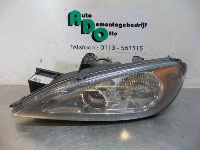 Phare gauche d'un Nissan Primera (Primera W99-), -, 3 mois de garantie, Utilisé, -