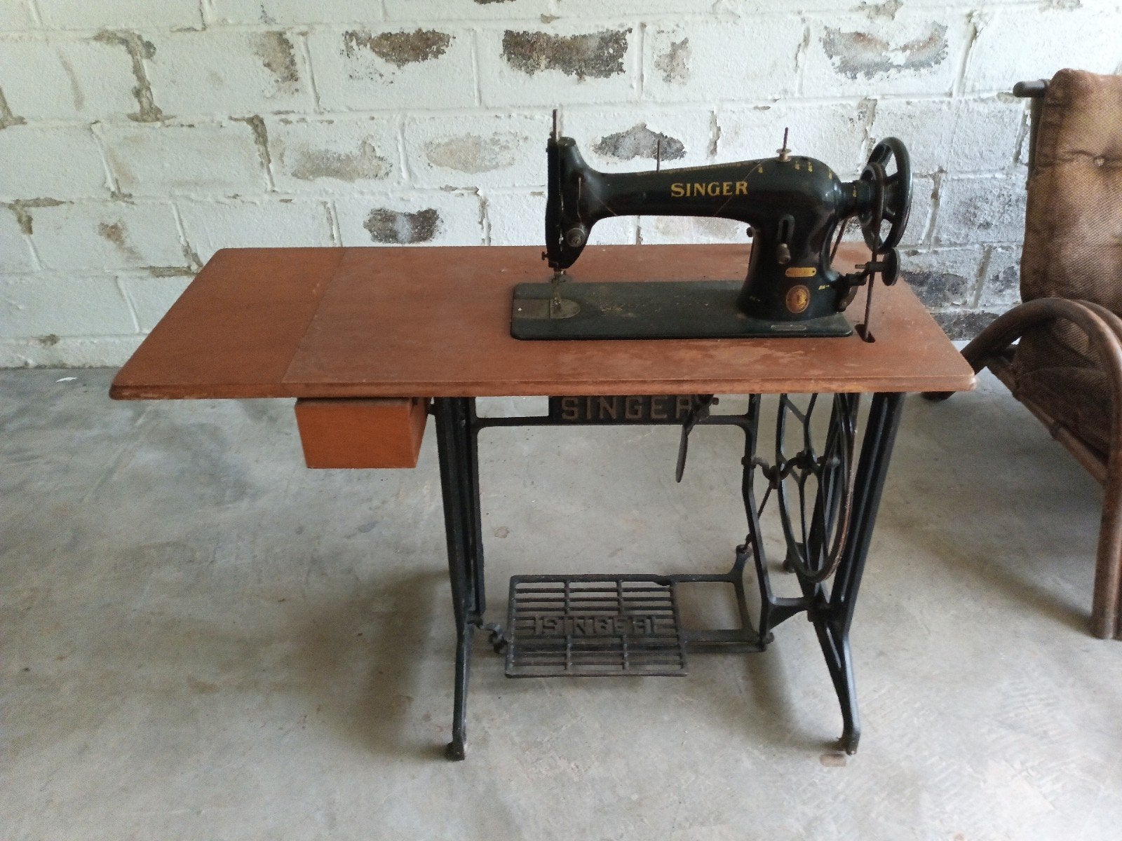 ancienne machine à coudre Singer, Ophalen