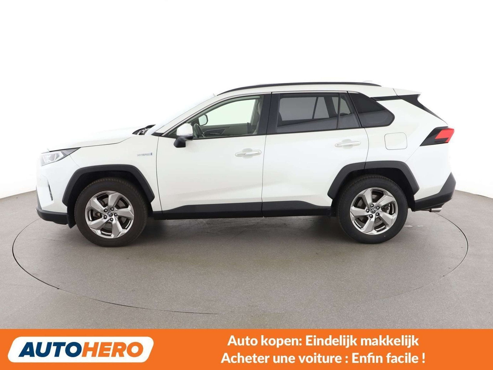 Toyota RAV4 2.5 Hybrid 4x2 (bj 2019, automaat), Auto's, Gebruikt, Wit, Leder, 5 zetels