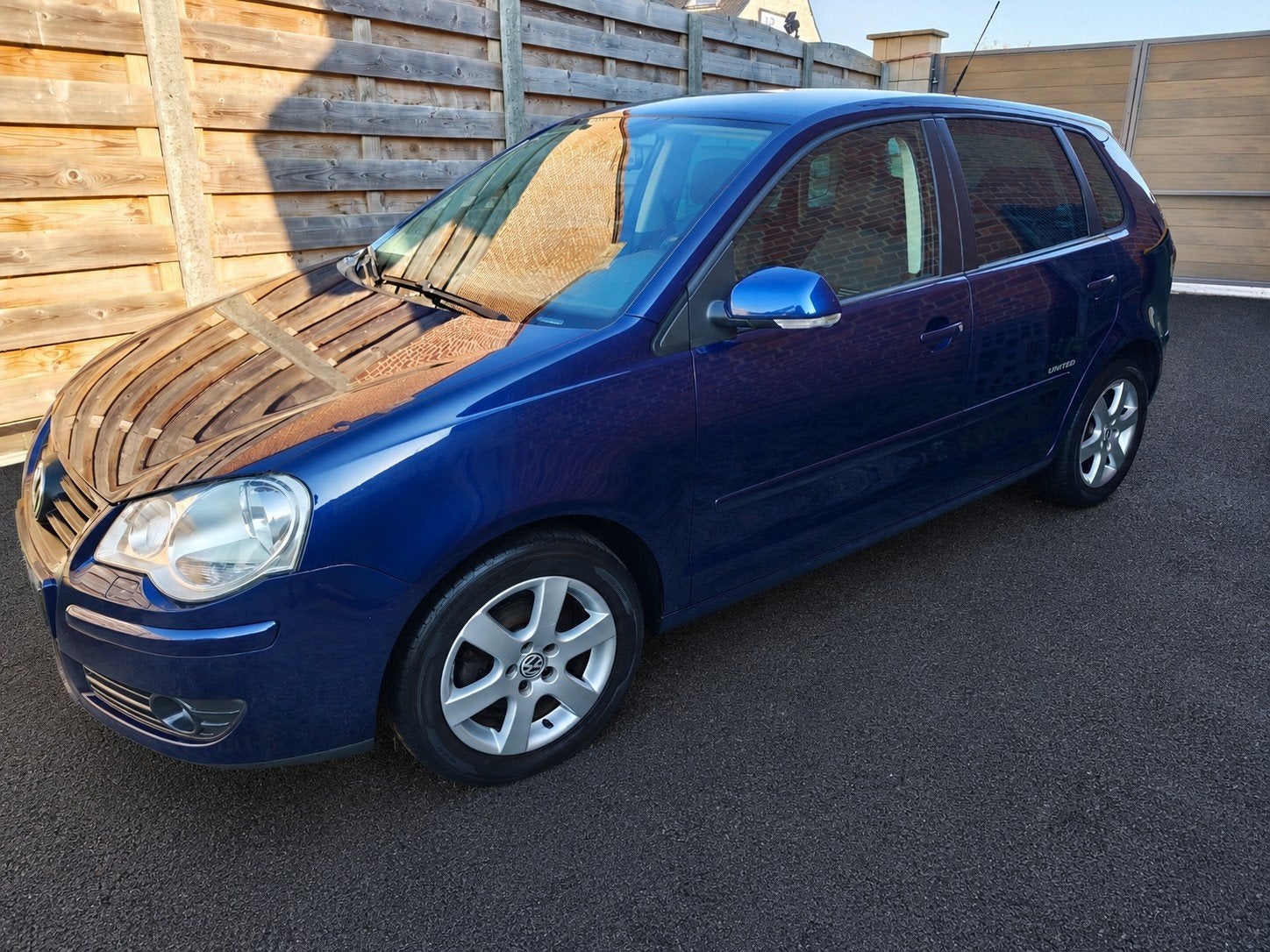 VW Polo 9N3 1.2 Benzine United Airconditioning PDC Cruise, Blauw, Leder, Handgeschakeld, 5 deurs