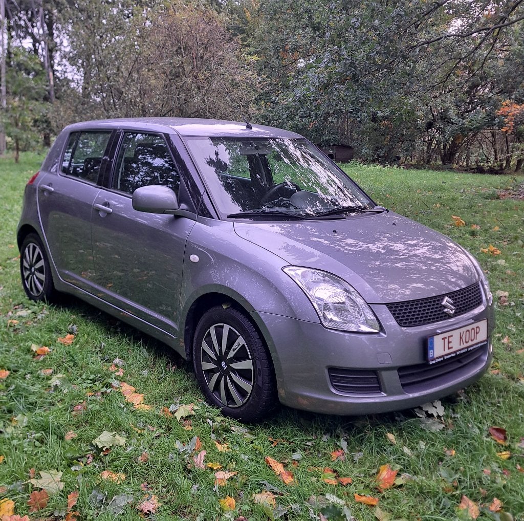 Suzuki Swift: 90.000km+ airco+ jaar garantie+groot nazicht!, Auto's, 116 g/km, Stof, Swift, Bedrijf