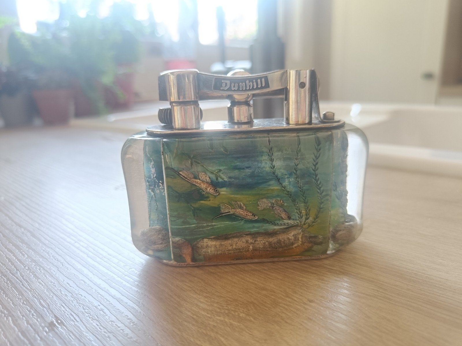 dunhill aquarium benzine aansteker, Ophalen