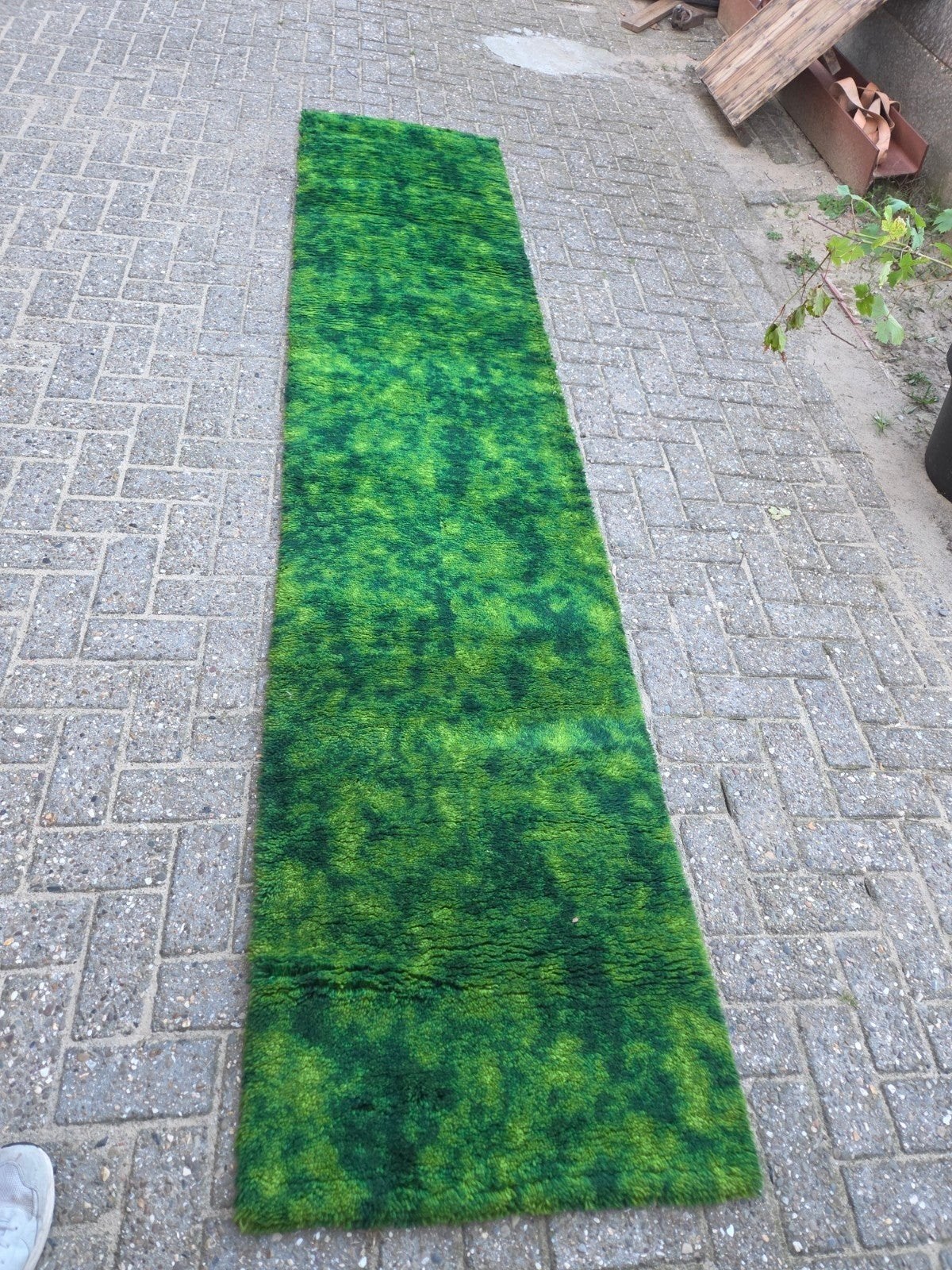 vintage tapijt, Ophalen