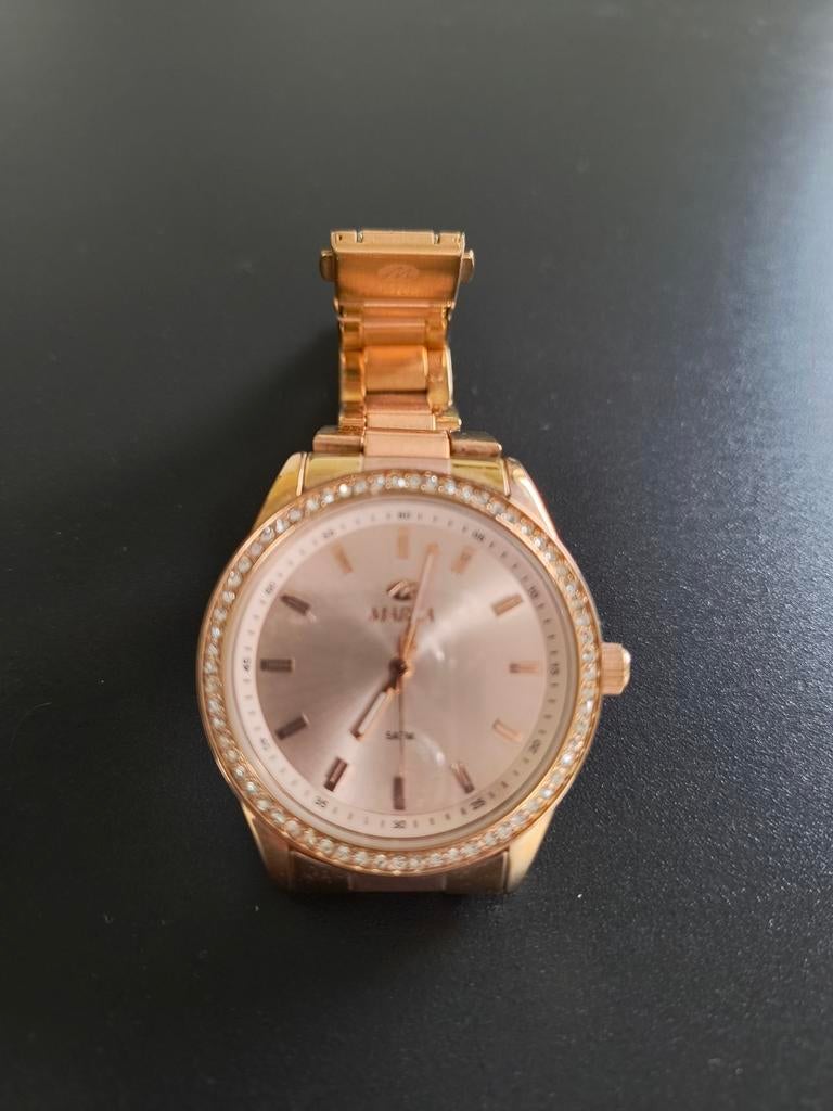 Roos goud kleurig horloge, Bijoux, Sacs & Beauté, Montre-bracelet, Autres marques, Enlèvement ou Envoi, Comme neuf