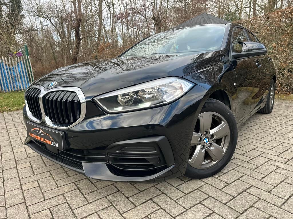 BMW 118i Pack M * GARANTIE * CarPlay * Bluetooth * Euro 6 d, Bluetooth, Zwart, 5 deurs, 103 kW